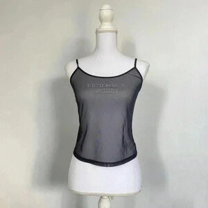 Black Victoria’s Secret micro mesh bedazzled tank top.